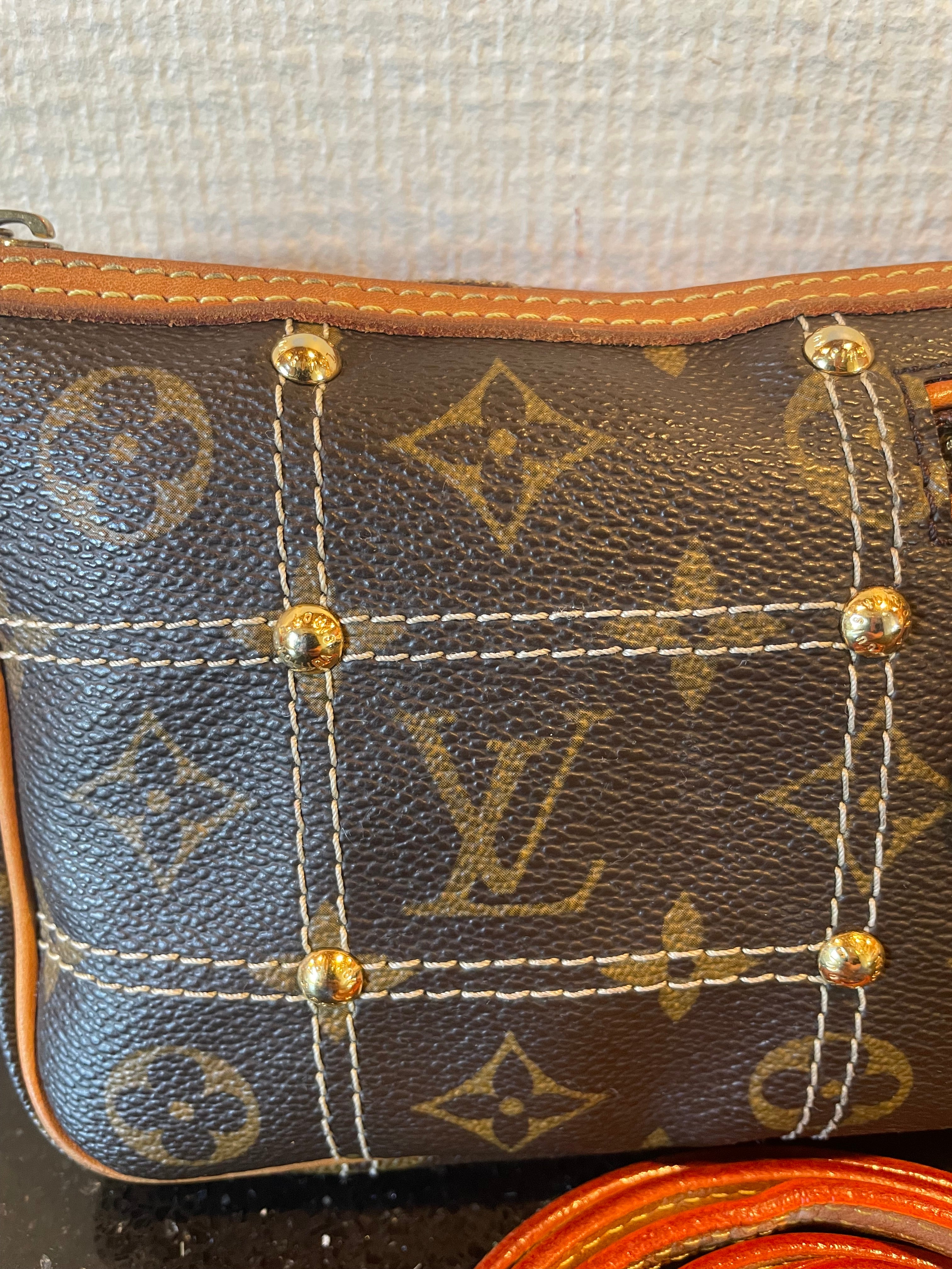 Louis Vuitton Rivets Pochette